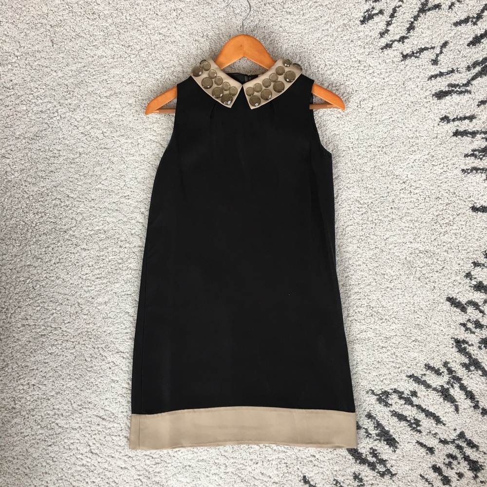 Kate Spade: Sophisticated Sleeveless Shift